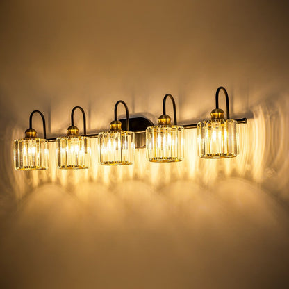 Lampada da bagno lineare Glam a 5 luci dimmerabile in cristallo con paralume cilindrico in cristallo