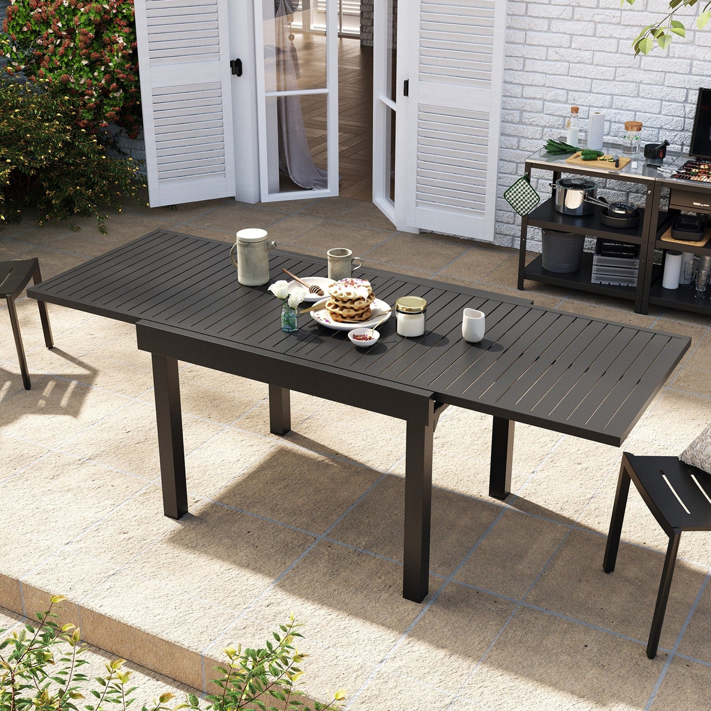 Set da pranzo per esterni in alluminio Pellebant da 5/7/9 pezzi con tavolo estensibile e sedie impilabili